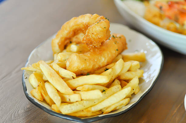 istock fish and chip or fried fish ,deep fried fish with French fries 2224896789