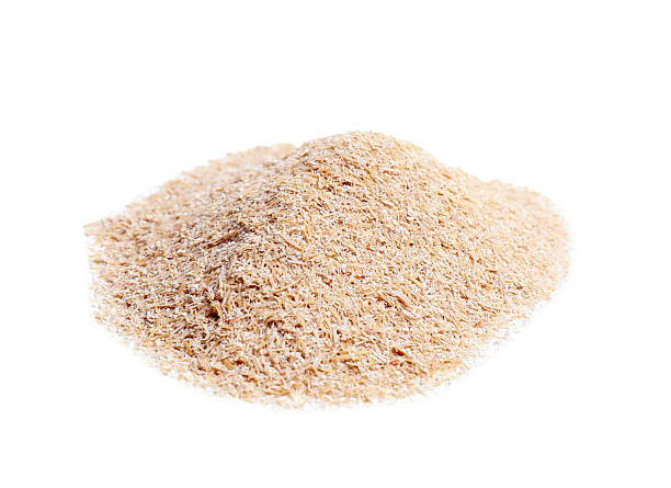 istock Pile of oat bran isolated on white 2224897702