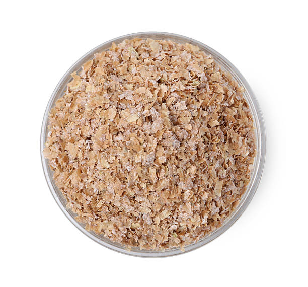istock Buckwheat bran in bowl isolated on white, top view 2224898240