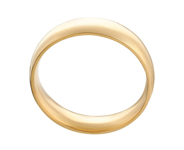 istock Beautiful golden wedding ring isolated on white 2224898331