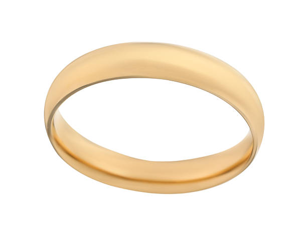 istock Beautiful golden wedding ring isolated on white 2224898336