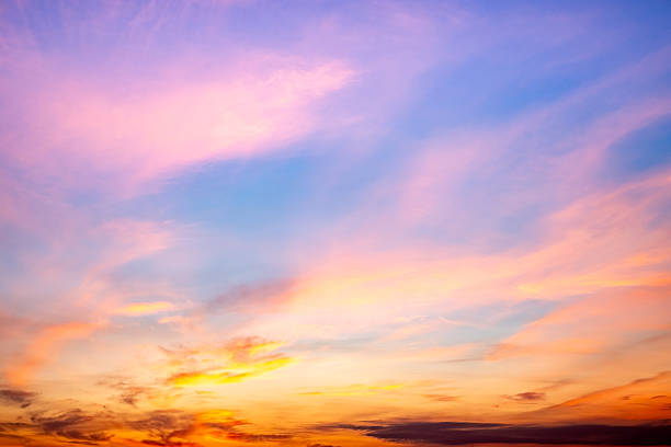 istock Beautiful , luxury soft gradient orange gold clouds and sunlight on the blue sky perfect for the background, take in evening,Twilight, Large size, high definition landscape photo 2224899415
