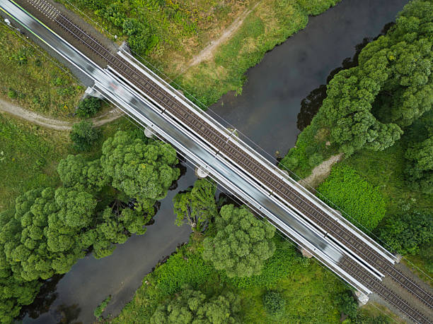 istock Unique elevated rail bridge spans lush green valley under blue sky showcasing remarkable infrastructure and scenic beauty of natural surroundings 2224900618