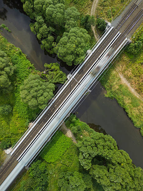 istock Unique elevated rail bridge spans lush green valley under blue sky showcasing remarkable infrastructure and scenic beauty of natural surroundings 2224900658