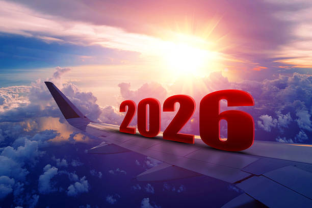 istock Airplane wing flying at sunrise in 2026 2224902760
