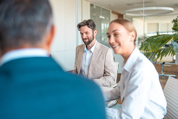 istock Diverse Financial Experts Engaged in Modern Boardroom Discussion 2224904731