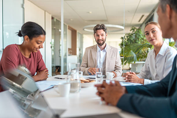 istock Diverse Financial Experts Engaged in Modern Boardroom Discussion 2224904739