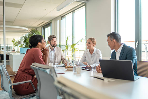istock Diverse Financial Experts Engaged in Boardroom Discussion 2224904748
