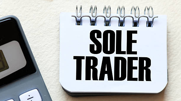istock SOLE TRADER the word in a small office notebook. 2224912157