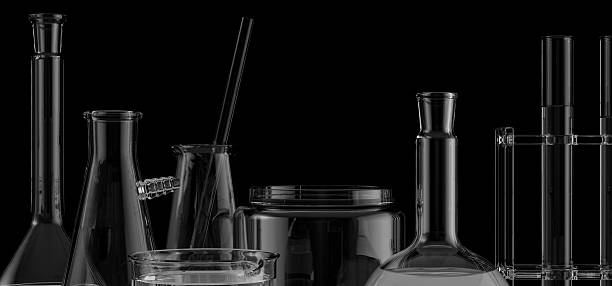 Elegant black glass laboratory flasks and beakers on a dark background. Modern 3D rendering perfect for cosmetics, pharmaceutical innovation, scientific research, and biotech product presentations.