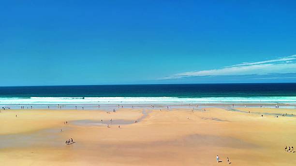 istock Experience the breathtaking beach views adorned with clear blue skies and soft, inviting sand 2224913815