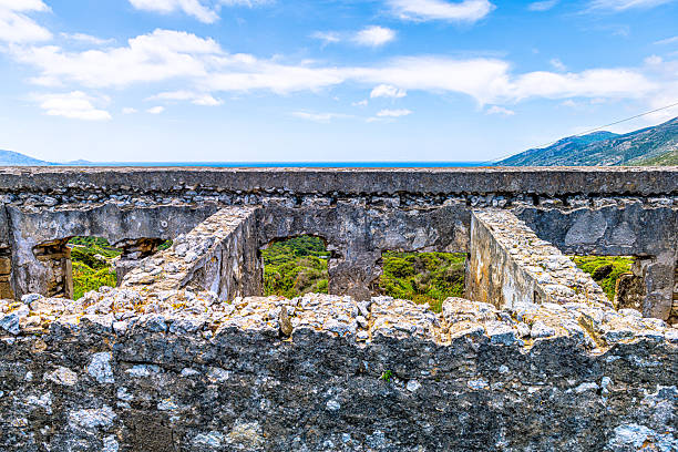 Abandoned stone structure abstract view pattern of Nazi German world war 2 bunker building on trail to Greek Drakano tower on Ikaria island, Greece