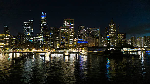 istock Reflections on water. San Francisco skyline with illuminated skyscrapers mirrored in bay at night. 2224917776
