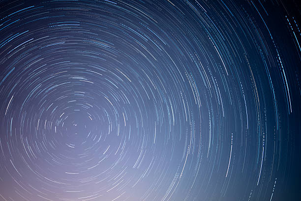 istock Star Trails Over Hong Kong Night Sky 2224920852
