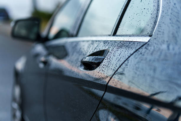 Car door with rain droplets