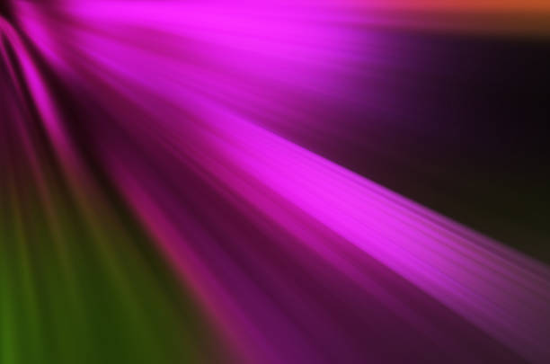 istock Bright purple light beams piercing darkness creating dynamic and mystical abstract background 2224924291