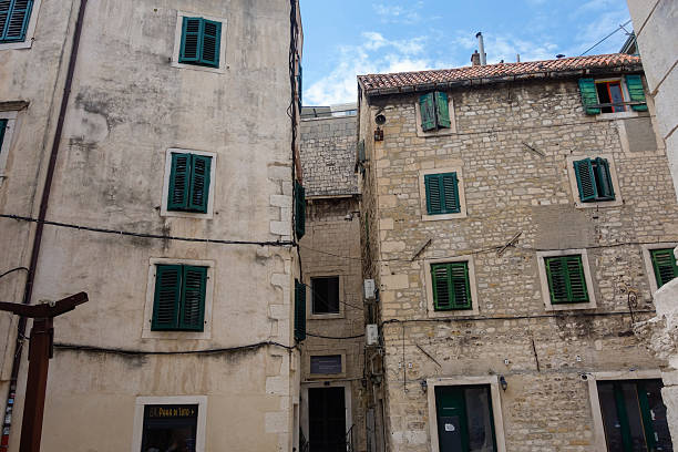 Split, Croatia: facade of old building and ancient architecture in old town.