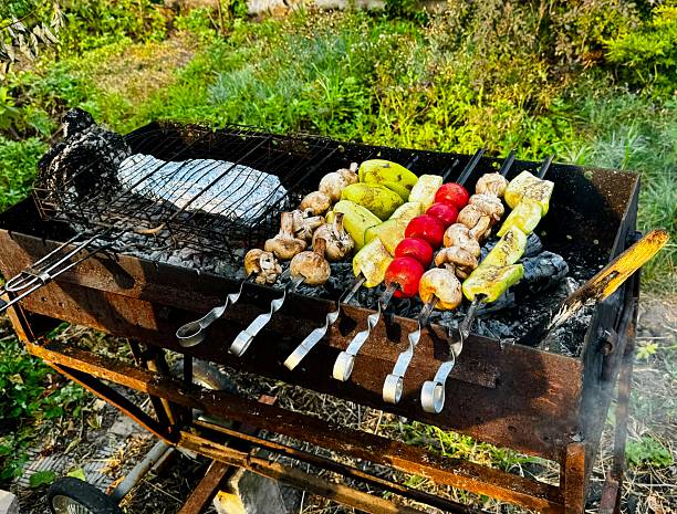 Grilled vegetables are prepared outdoors