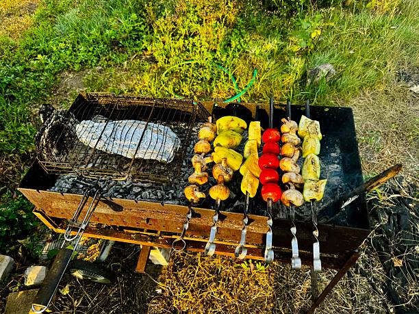 Grilled vegetables are prepared outdoors