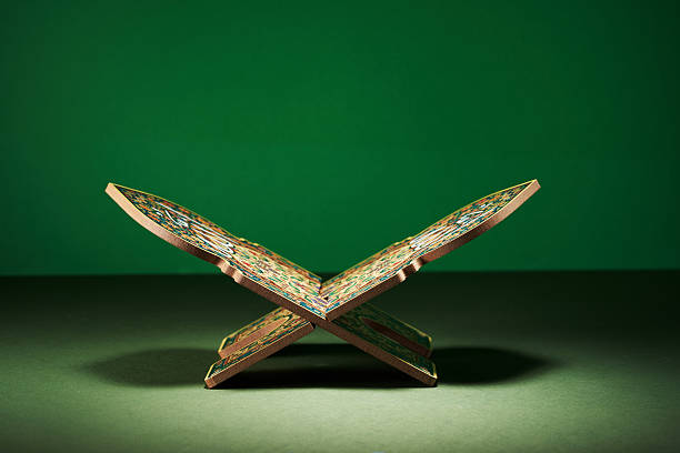 vintage koran stand isolated on a green background