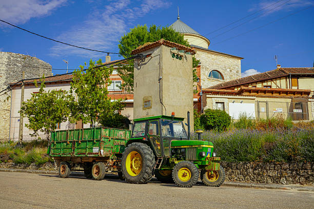 Segovia, Spain, July 10, 2025. Tracktor parked on the street, in a small town in the province of Segovia.