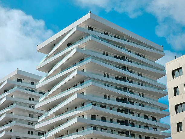 istock Sleek Symmetry: Contemporary Apartment Architecture with Angled Balconies low angle view 2224930767