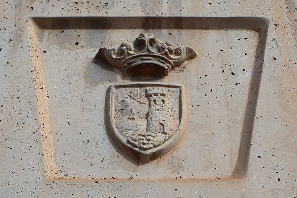 istock Intricately carved stone emblem with historical significance 2224934992