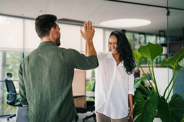 istock Group of young multi-ethnic startup business team collaborating on project in modern office 2224940093