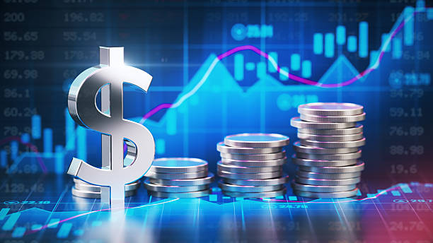 istock Metallic Dollar Sign and Coins Over Financial Chart Background 2224946592