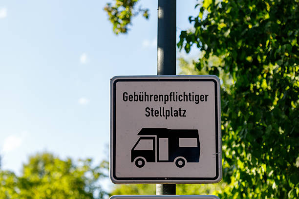 Main road traffic sign in the countryside in summer.
