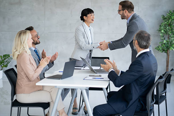 istock Business team collaboration and handshake in the office 2224965947