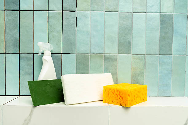 istock Cleaning tools and epoxy grout materials arranged on a tiled surface in a renovation space 2224965972