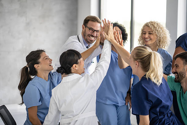 istock Doctors and nurses having a positive team celebration 2224966035