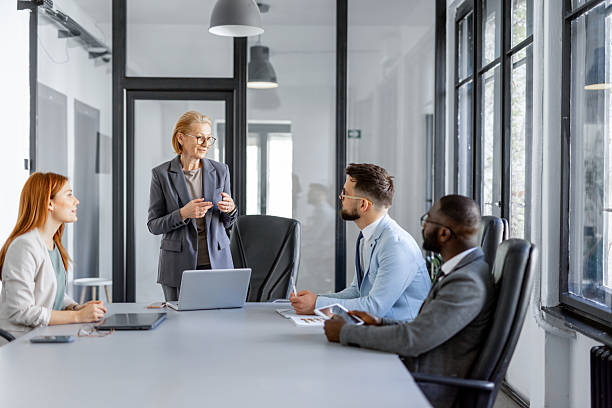 istock Formal business meeting with team discussing agenda items 2224966069