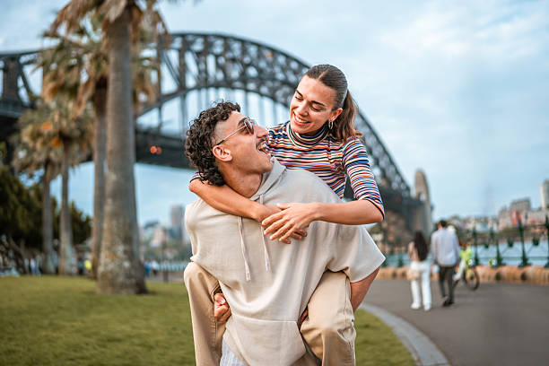 istock Joyful Young Hispanic Couple Enjoying Sydney Outdoors by Iconic Bridge 2224967340