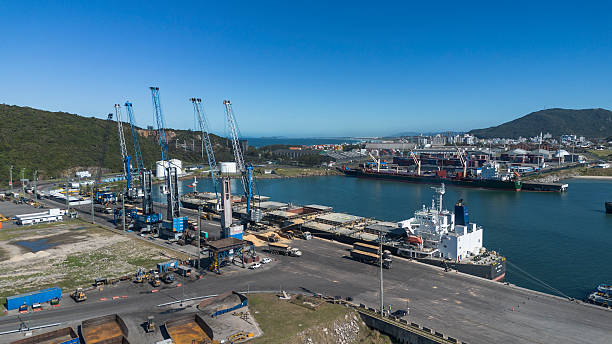 istock Aerial view of cargo port in operation 2224971495