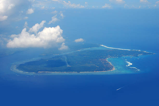 istock Aerial view from wimdow airplane sky summer tropical blue sky fluffy white cloud summertime on light sunny day cloudscape ocean seascape. Clear bright blue skyline spring sunlight climate background 2224971523