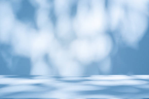 istock Studio style background wall decoration presentation uses white and blue tones. with shadows cast from a nearby window, concept creating a decorative 2224988612