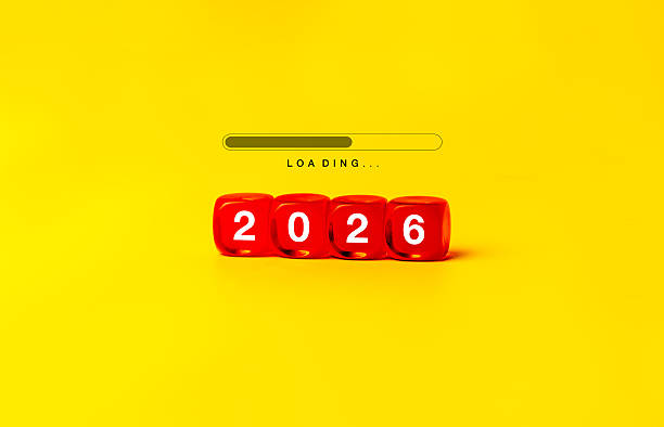 istock Loading to Merry christmas and begin a happy new year 2026 banner background. Loading progress bar on 2026 year numbers on red dice on yellow background, modern minimalist, design trends concept. 2224992556