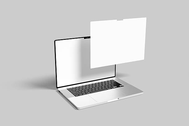 istock Silver laptop with black keyboard and blank white screen, shown from an angled top view with a floating blank screen. Perfect for tech and design mockups. 2224993898