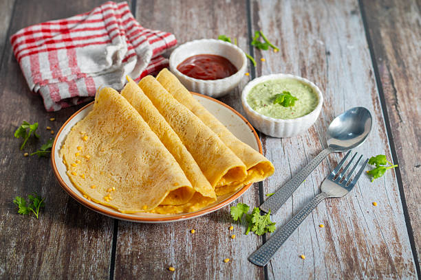 istock Moong dal chilla is a savory Indian pancake made from ground moong lentils, spiced with herbs, onions, and green chilies, perfect for healthy breakfast. 2224994591