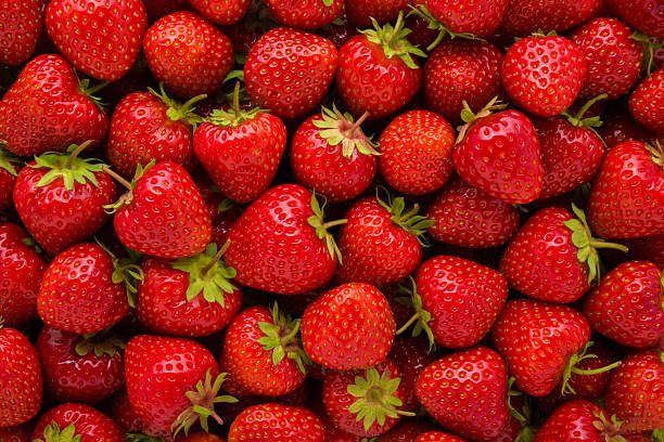 istock Red bright strawberries background. Fresh berries. Closeup. Top down view. 2225000686