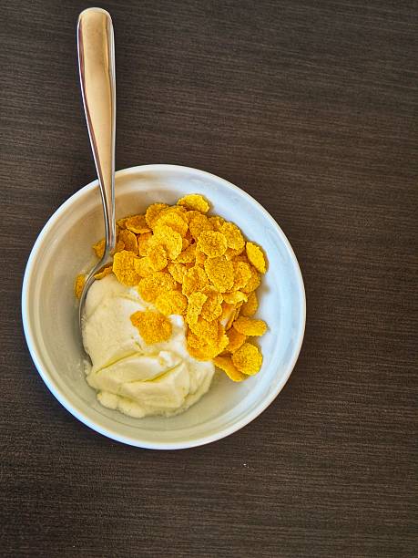 yogurt with cereal in a bowl.