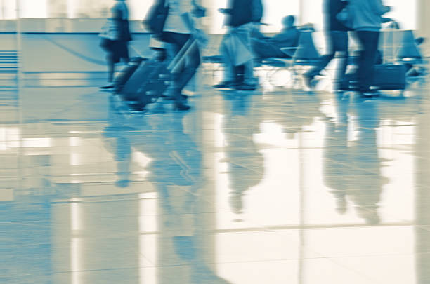 Abstract of People Walking on Airport. Motion Blur Effect. Horizontally.