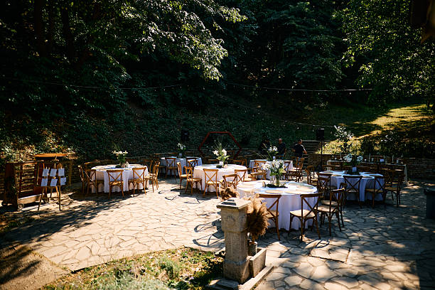 istock Wedding reception being prepared in a beautiful garden venue 2225010001