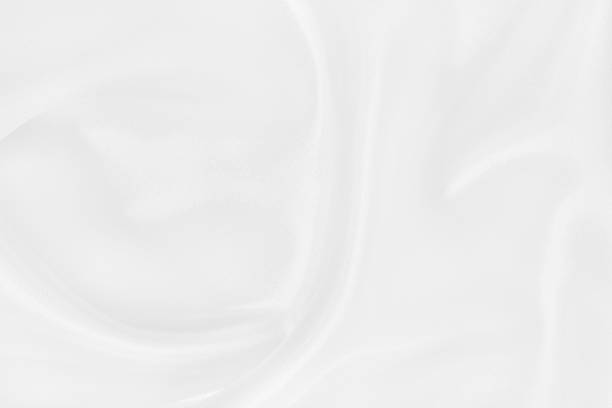 istock White fabric texture background, detail of silk or linen pattern. 2225010999