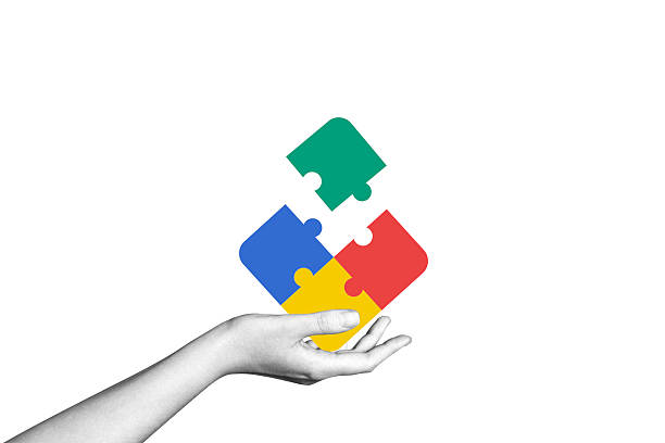 istock Modern collage hands connect puzzle pieces. Teamwork concept, business idea, brainstorming. Creative solution. Merger of organizations. Partnership. 2225011703