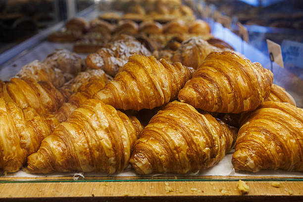 istock Freshly Baked Golden Croissants on Display 2225012164