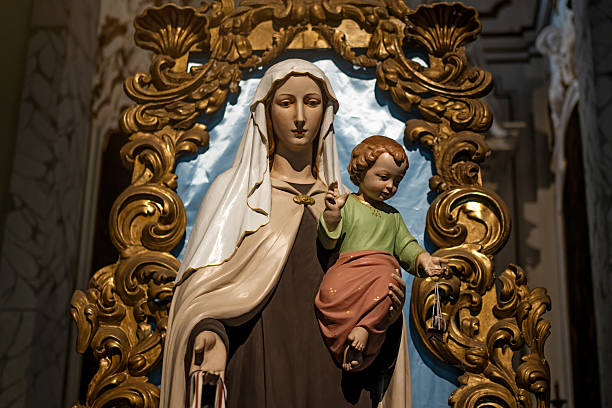 istock Virgin Mary Holding Baby Jesus Religious Statue 2225013386
