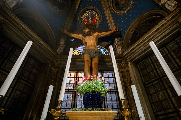 istock Crucifixion Statue in Ornate Church Altar 2225013411